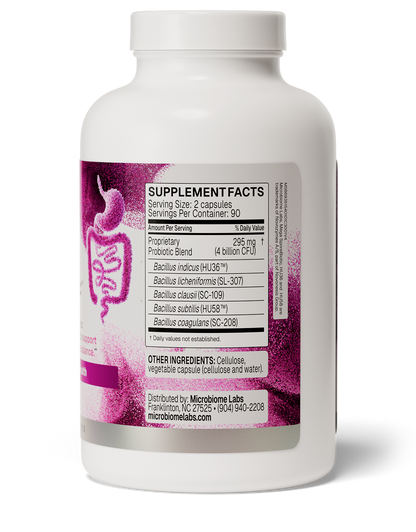 A white plastic bottle of Microbiome Labs probiotic supplement with a white cap, showing the Supplement Facts label on a white background.